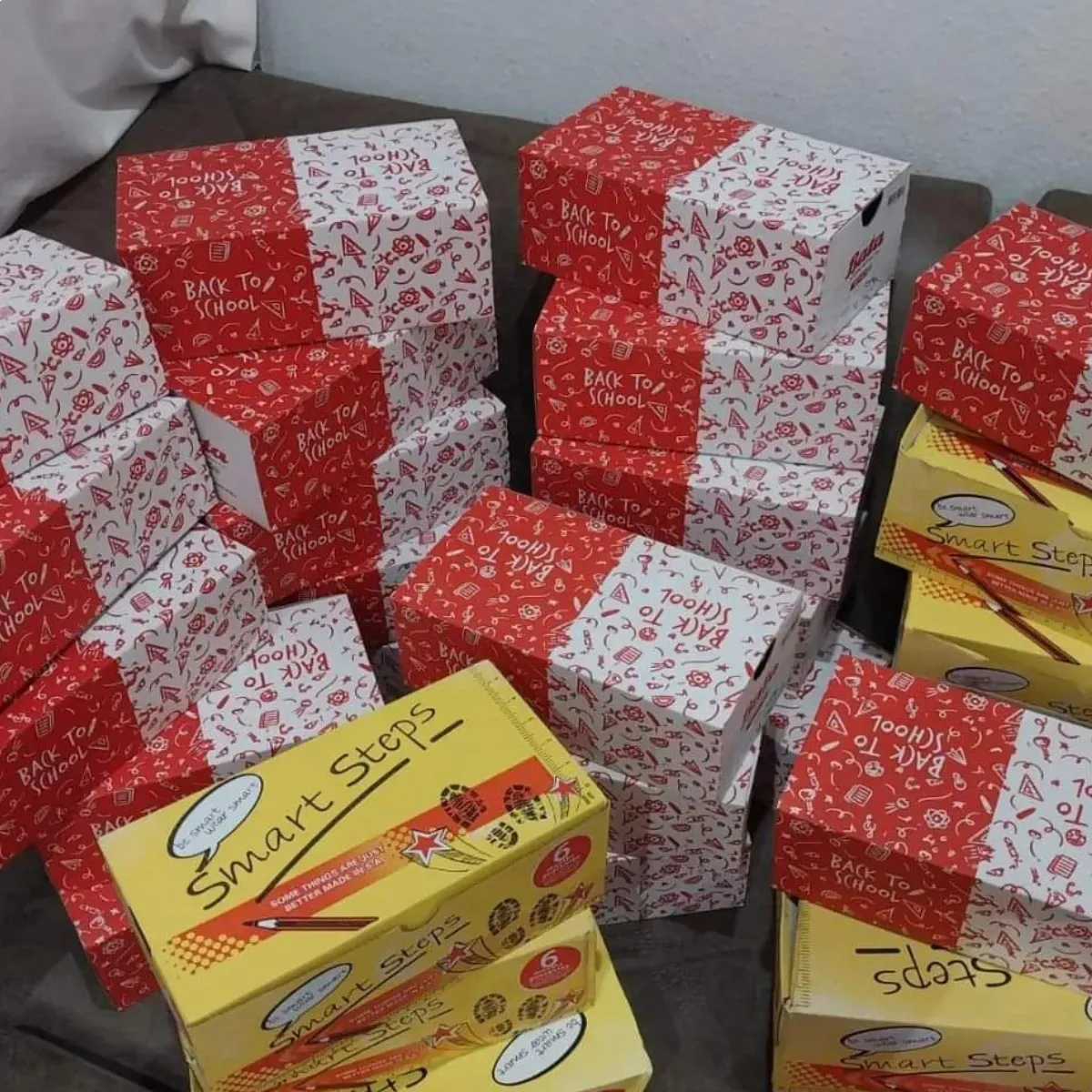Boxes of donated school shoes prepared for distribution in South Africa