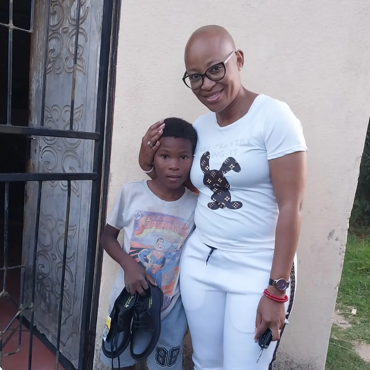 Child receiving support through Noms Drive school shoe donation programme