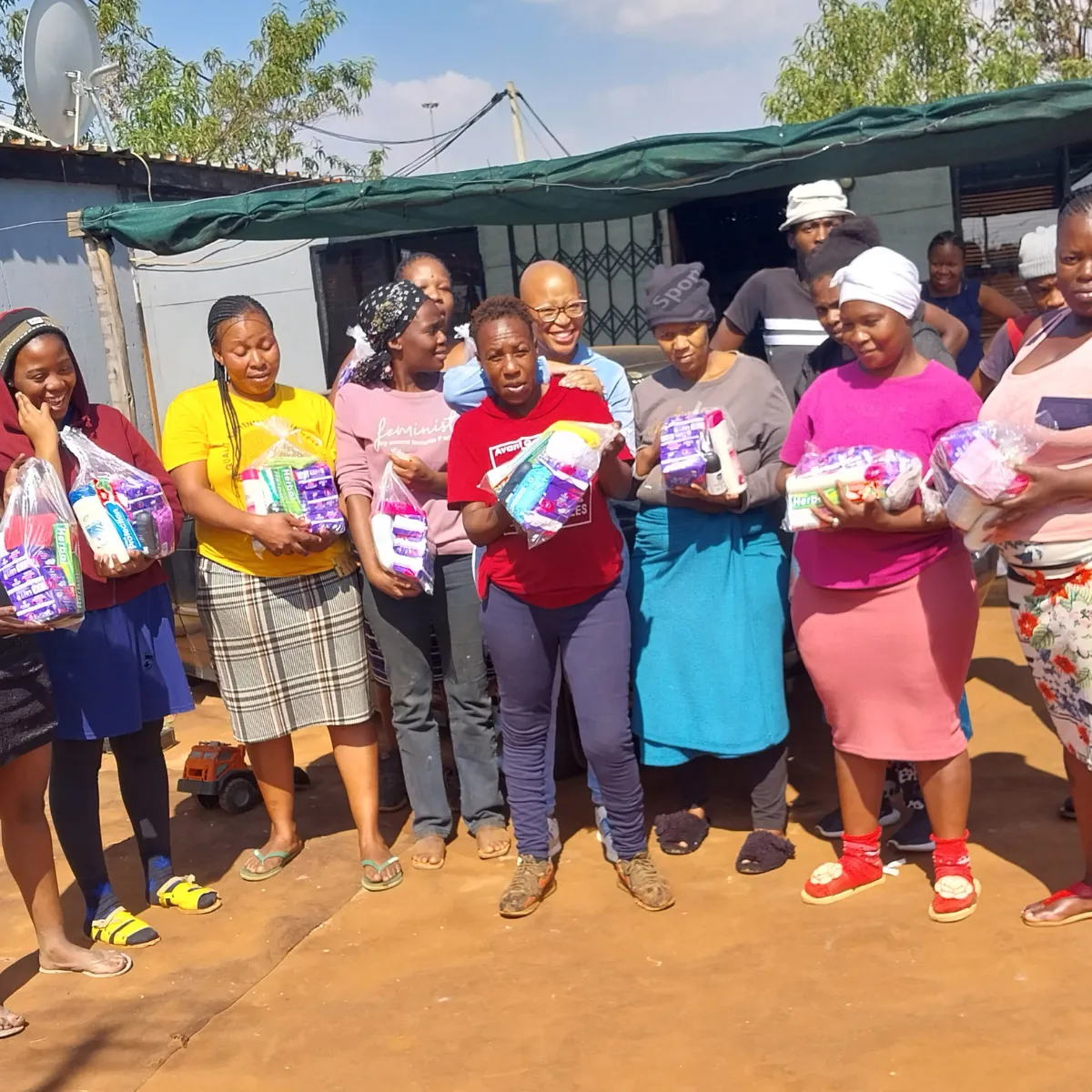 Community members receiving hygiene support from Noms Drive South Africa